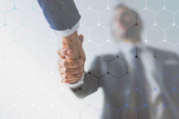 corporate-business-handshake-partners_53876-96139